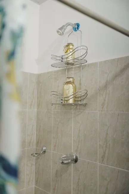 Descale a showerhead. Tie a vinegar-filled sandwich bag over the nozzle so it's submerged, and leave it at least an hour (overnight for heavy buildup)