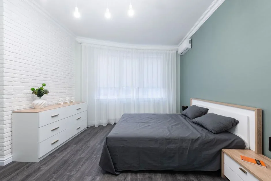 Never seal a bedroom or basement window shut. The model residential code (IRC Section R310) requires every sleeping room and basement to have at least