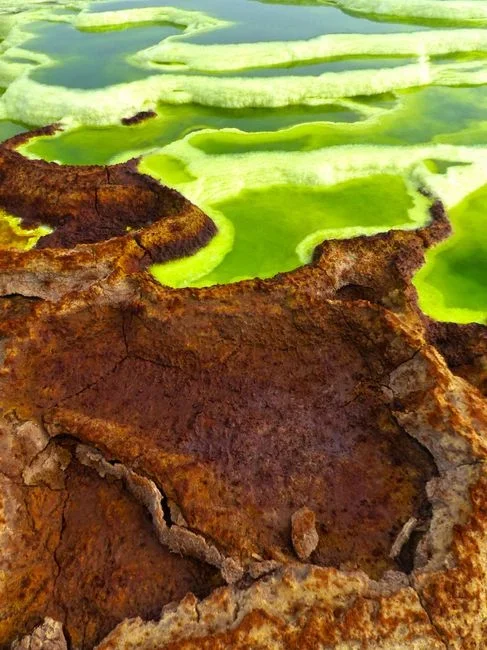 HOW: The acid attacks the oxide and pulls iron into solution. According to the physics outreach team at the University of Illinois, "a first step in r