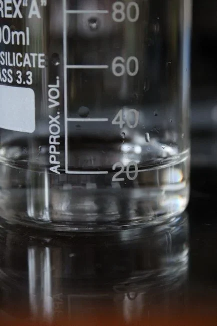 WHAT: Sodium silicate is a concrete densifier. Poured onto a slab, it soaks into the pores of the top layer and reacts with what is left over from the